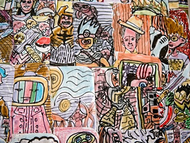 Des feuilles de papiers contenant beaucoup de dessins coloriés
