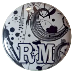 Badge à fond jaune pétant floqué Café Lecture Le Remue-Méninge Saint-Éienne